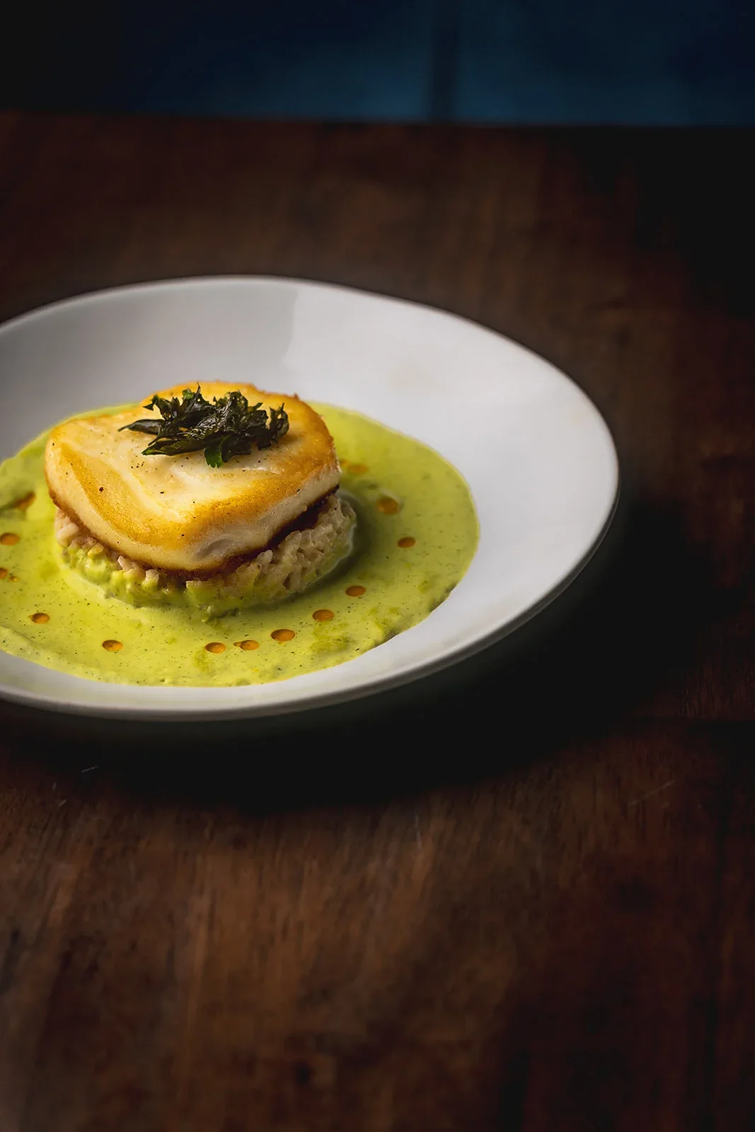 BLU Seafood Chilean sea bass served over risotto